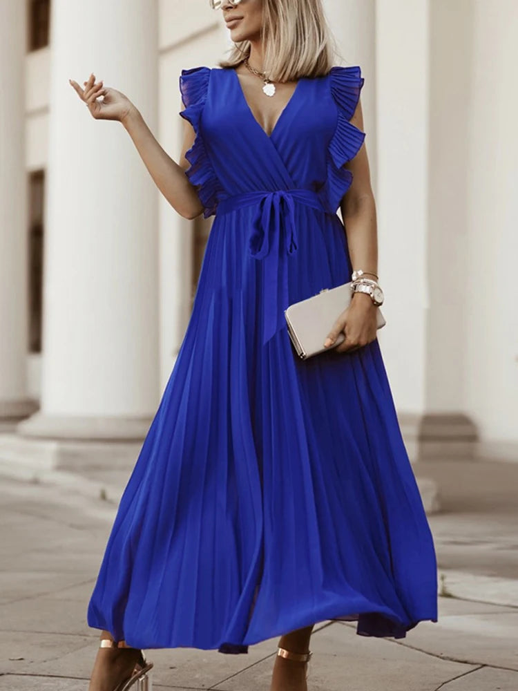 Enfärgad elegant klänning med V-ringad hals och volangärmar