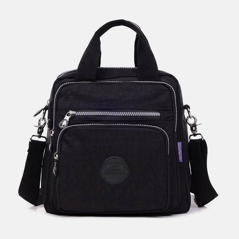 Multifunktionell crossbody-väska för vardagsbruk