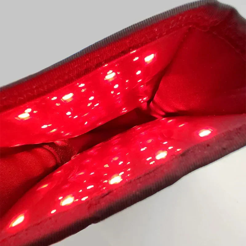 Hand therapy glove with infrared light device
